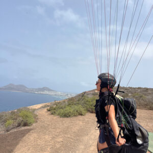 Student learning to fly paragliders